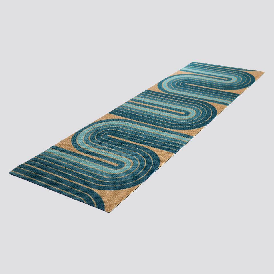 Mid century modern inspired doormat in aqua in coir. Retro vibes is a nostalgic nod shown in double door size