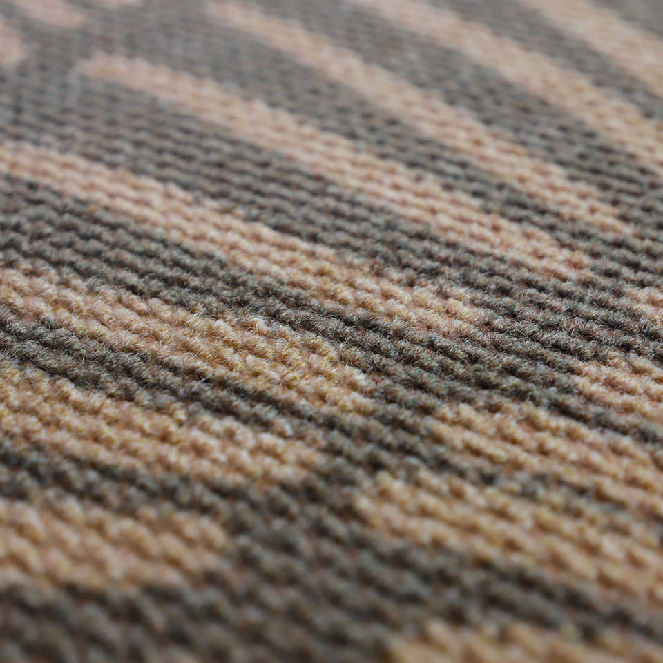 Close up of Sunburst tan and coir doormat showing our non shedding fibers.