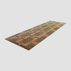 Angled shot of Tailfeathers modern crane double door doormat in coir and black.