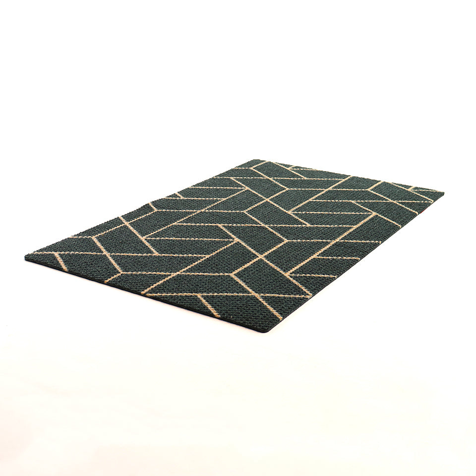 Low profile non shedding doormat in triangulation black/coir geometric pattern.