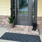 double door size due north doormat placed in front of step at front door entryway
