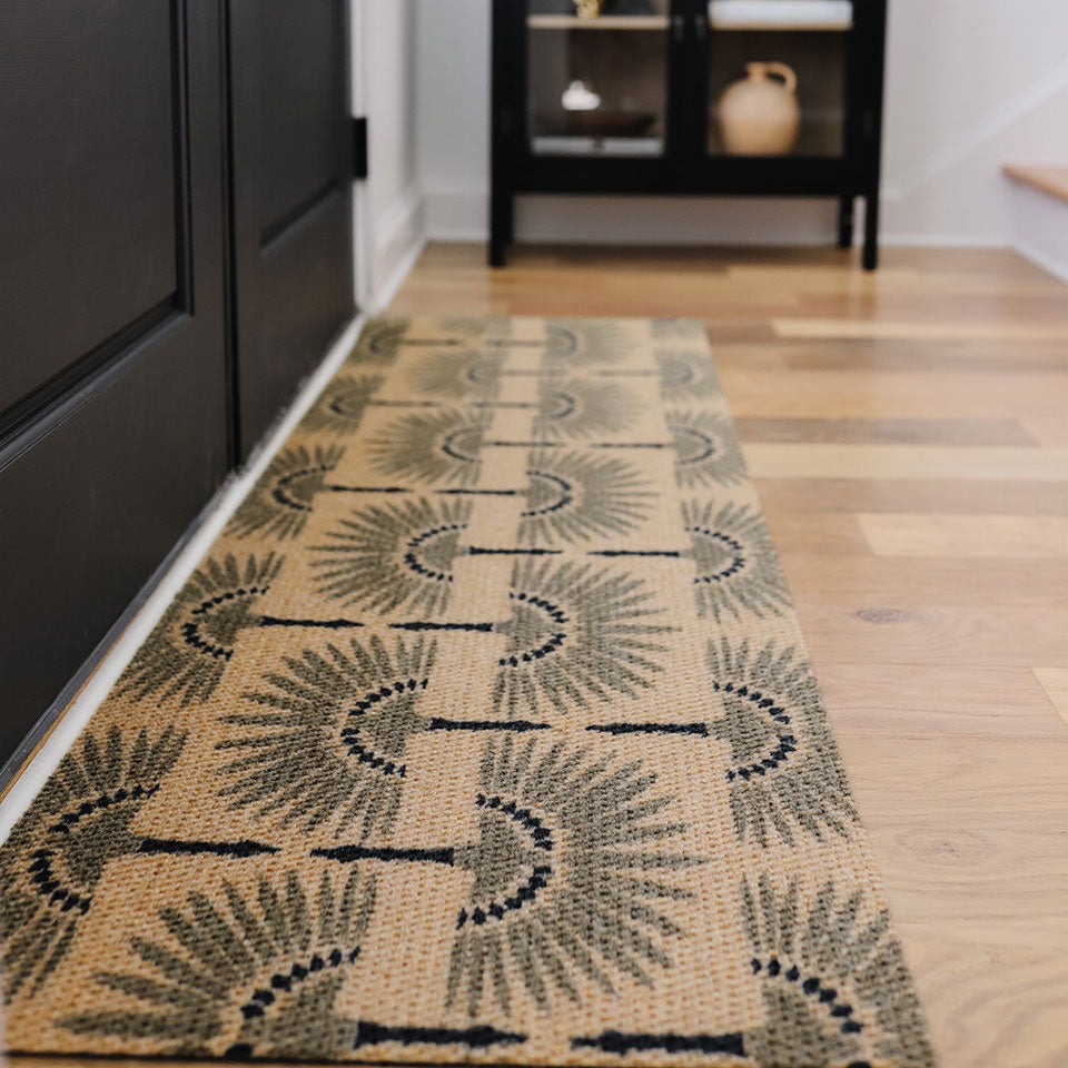 Tailfeathers double door doormat in brown is a modern door mat that will fit any set of double doors perfectly. Unique and durable doormat.
