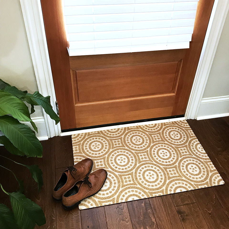 Coir and white single door doormat with circle medallion pattern