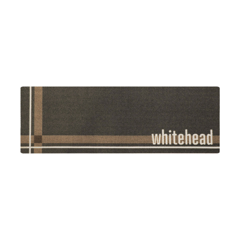 Double door sized entrance mat, personalized with your last name, on a non shedding army green surface