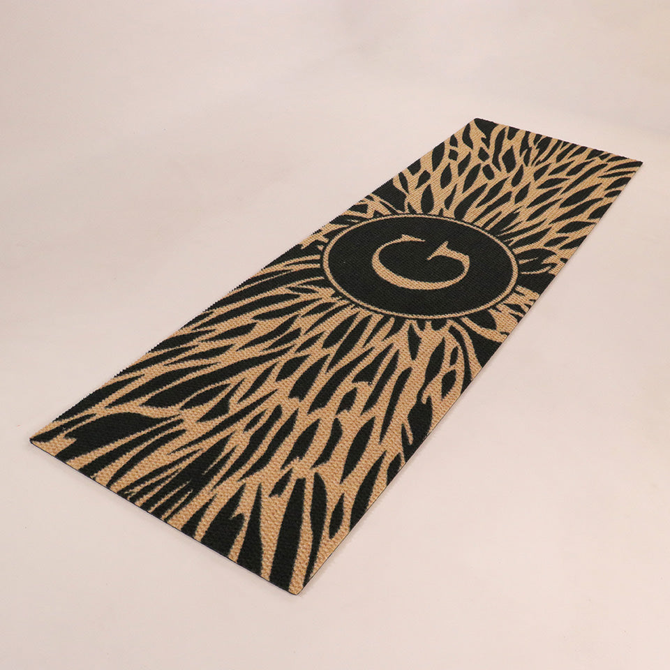 Dahlia double door mat angled overhead monogrammed G abstract line around it, black and coir