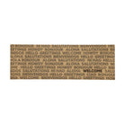 Double door overhead Global Greetings army colored text on coir repeating bilingual greetings with one black text hello