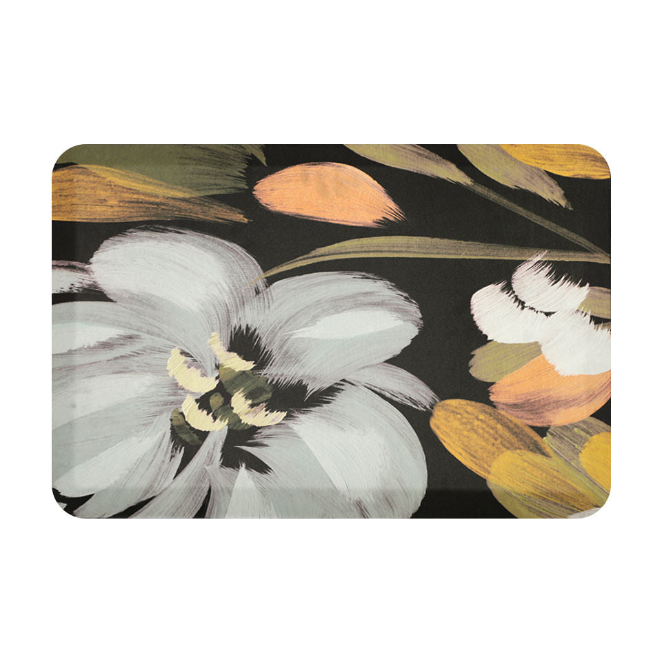 Comfortable anti-fatigue mat for standing with a beautiful, HD printed floral designs of abstract flowers on a black background