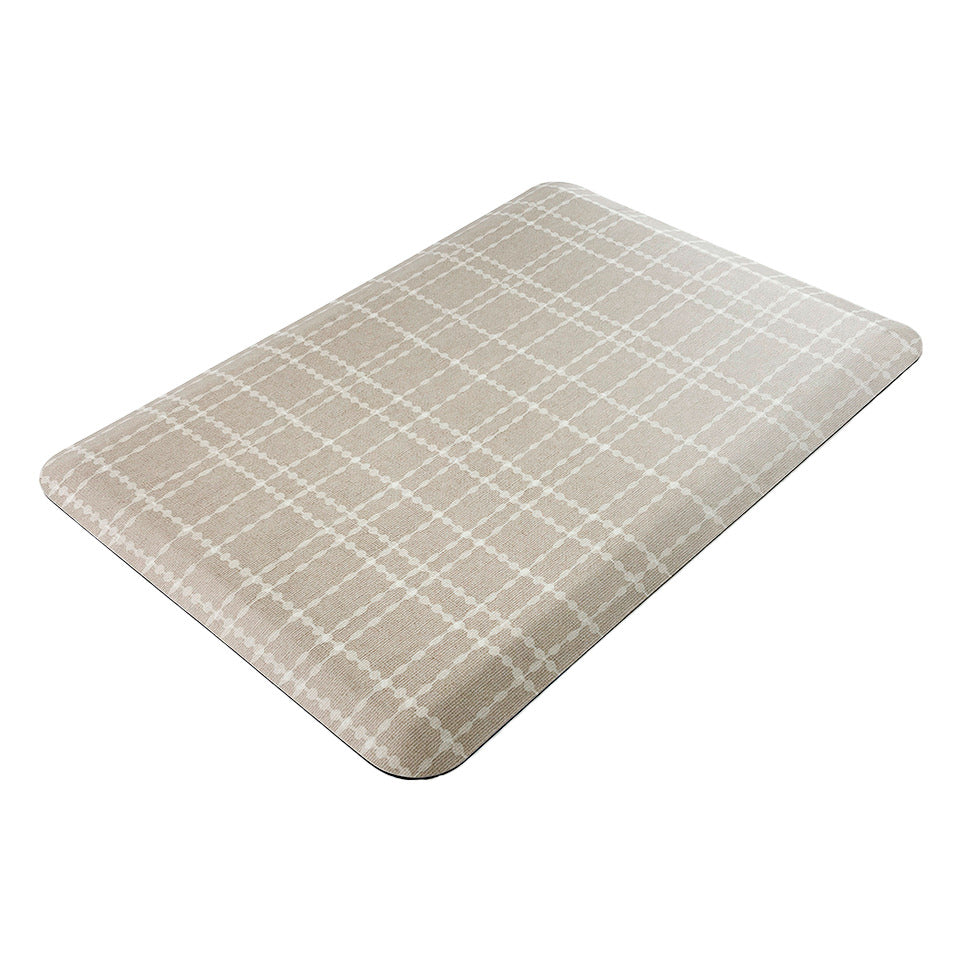 Happy Feet’s Beaded Plaid anti-fatigue small mat at an angle showing for its beveled edges.