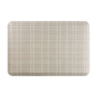 Happy Feet’s Beaded Plaid anti-fatigue small mat in beigey cream tones with a white, beaded plaid pattern.