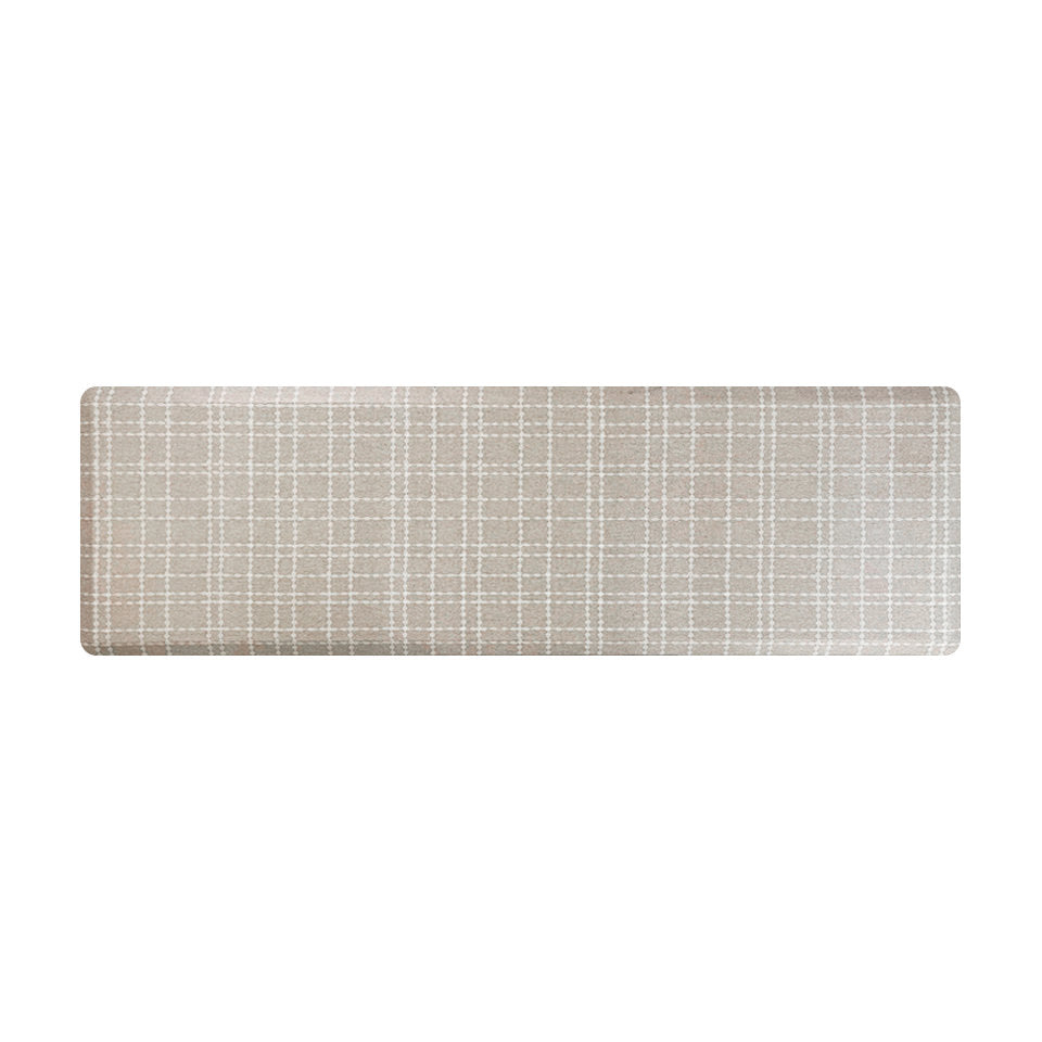 Happy Feet’s Beaded Plaid anti-fatigue runner mat in beigey cream tones with a white, beaded plaid pattern.