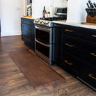 Traditional chestnut leather on a Happy Feet comfortable, anti-fatigue runner mat placed in the kitchen