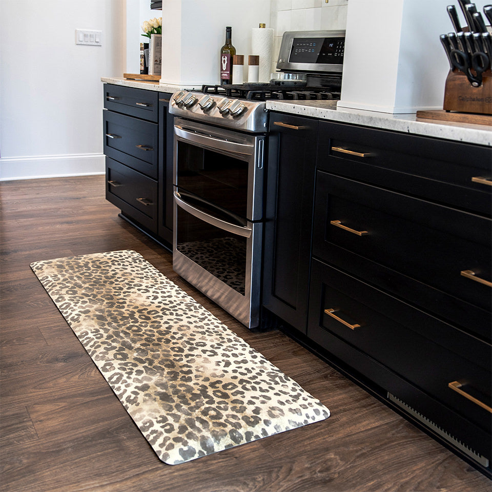 Eye-catching leopard printed anti-fatigue mat with a wipeable surface and smoothing transitional edging