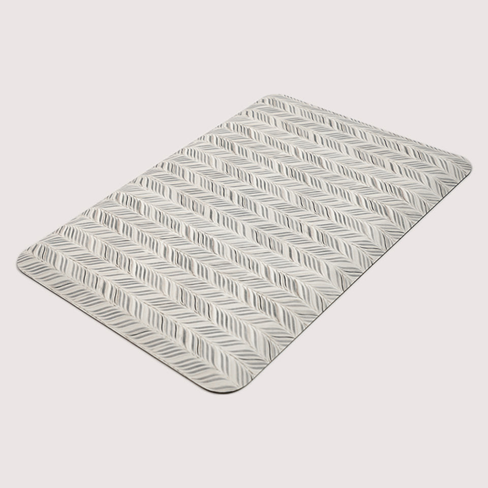 Happy Feet Featherbone design on an incredible standing comfortable mat for standing in kitchens or bathrooms