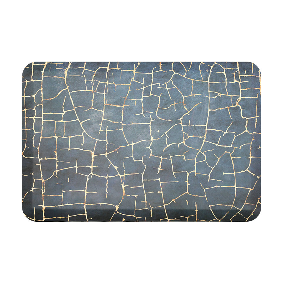 Overhead of anti-fatigue Kintsugi mat, surface of distressed blues and cracks of gold, wipeable and comfortable surface