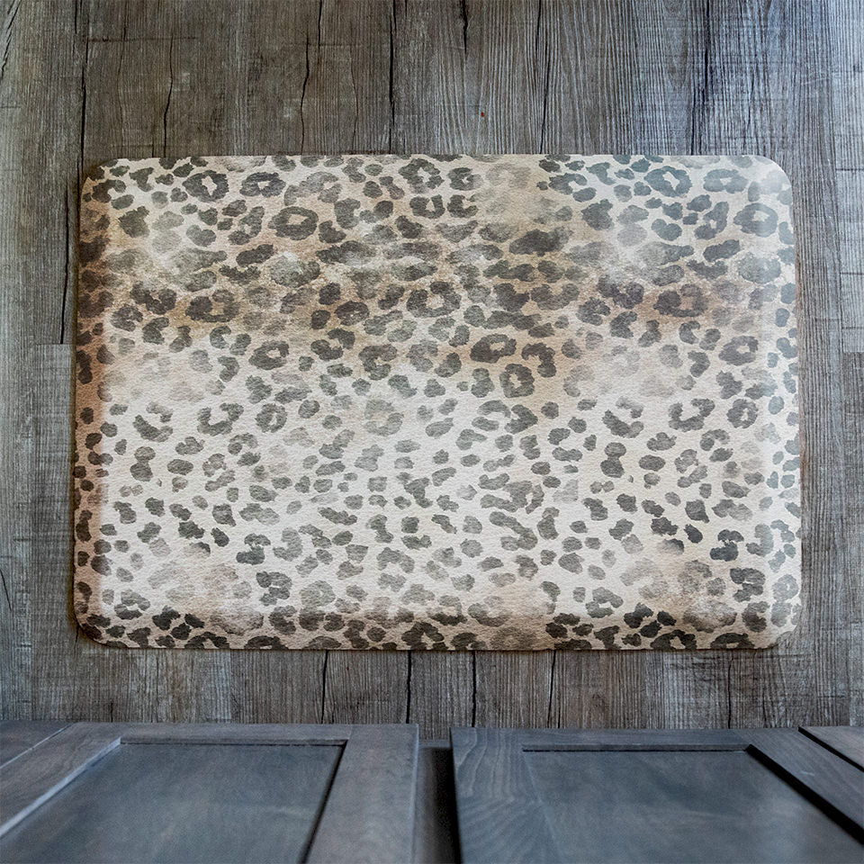 Happy Feet Leopard mat below a cabinet to provide comfort to standing