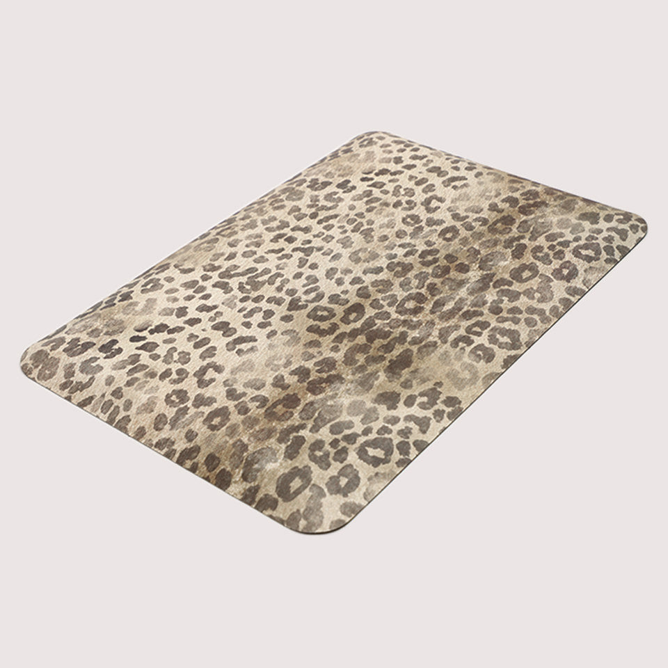 Happy Feet's modern weathered leopard mat with a comfortable foam and wipeable surface