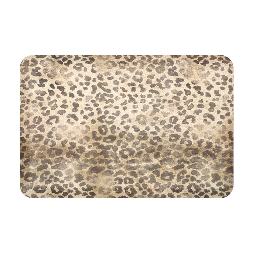 Overhead of Happy Feet's modern weathered leopard mat with a comfortable foam and wipeable surface