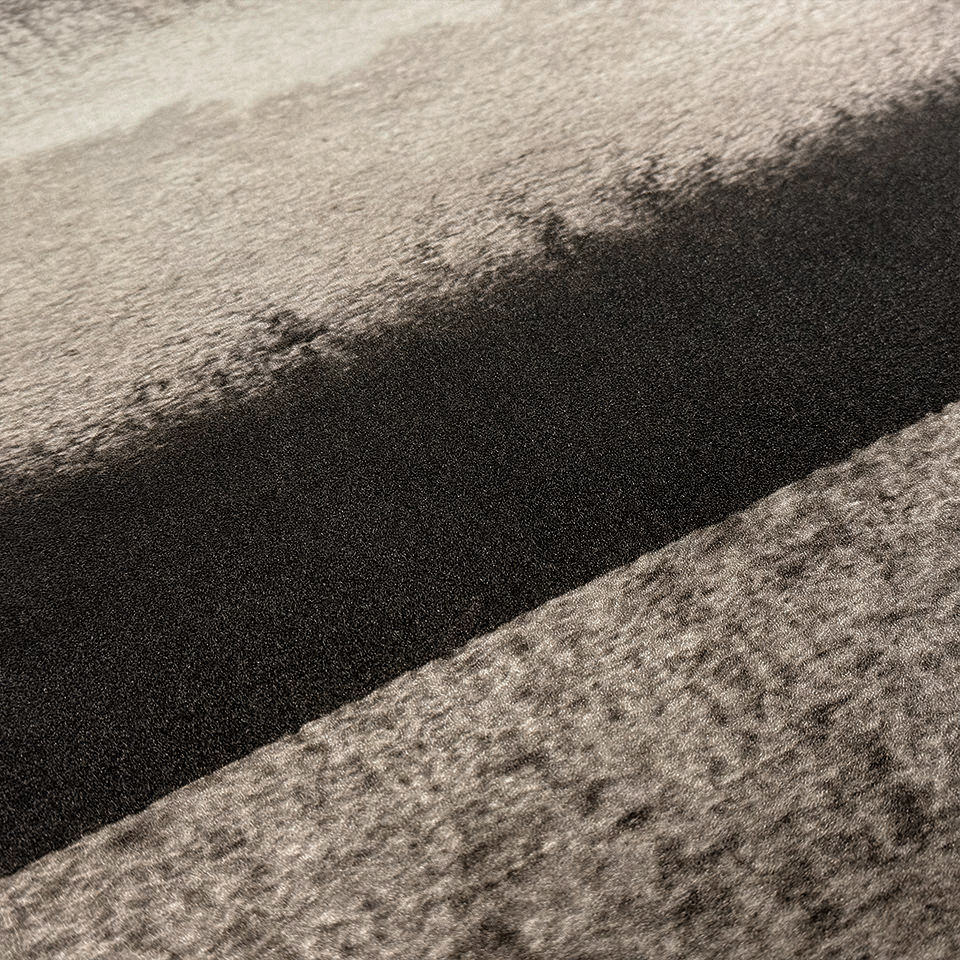 Detailed image of Moody Hue's misty landscape design in high-definition print of black, grey, and creams, on a wipeable surface