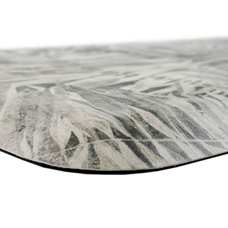 Happy Feet’s Tranquil Palms anti-fatigue mat with sloped, beveled edges for a smooth transition and comfortable foam backing.