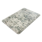 Happy Feet’s Tranquil Palms anti-fatigue small mat at an angle showing for its beveled edges.