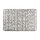 Happy Feet’s Variegated Vine anti-fatigue small mat with a leafy vine pattern in white on a textured grey background.