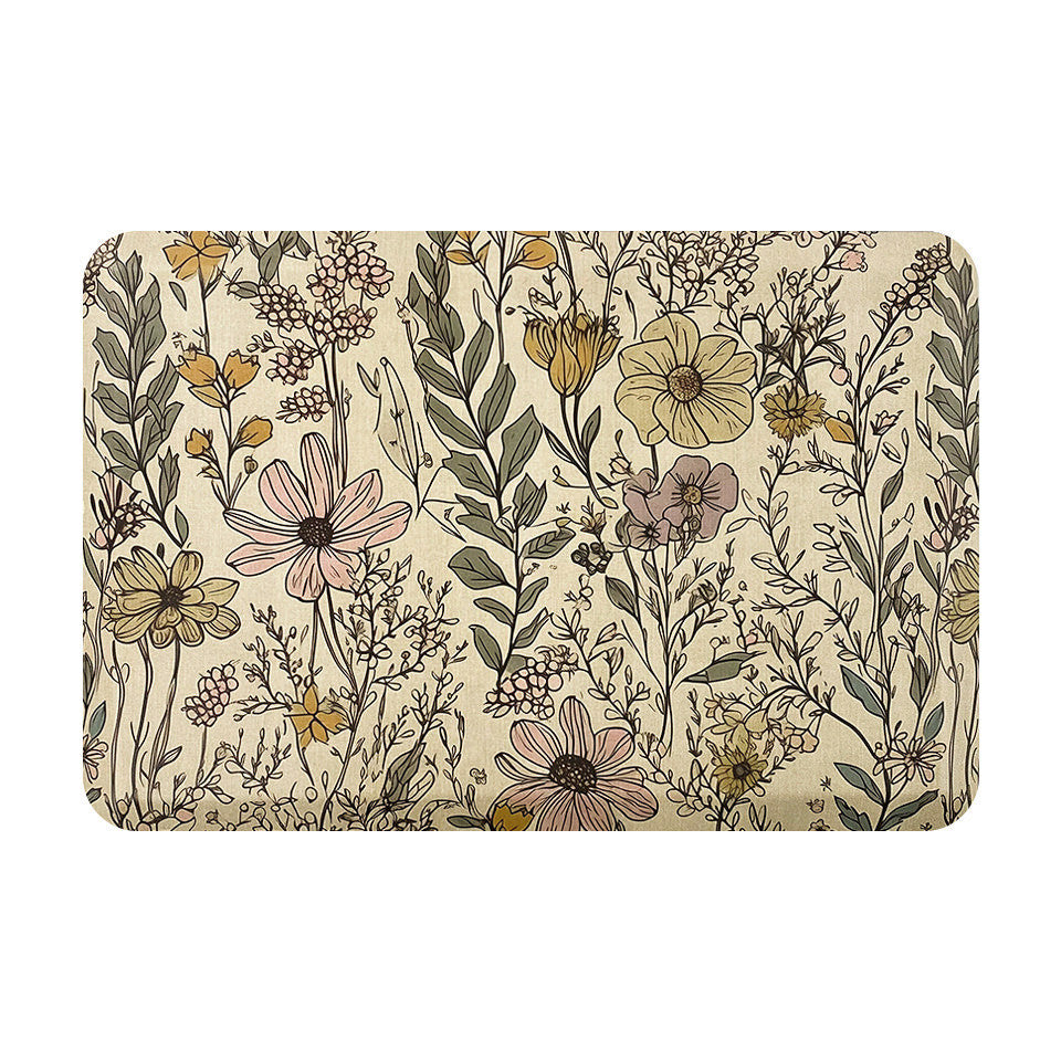Happy Feet's anti-fatigue Wildflowers mat on a light beige color with a canvas-liked textured background.