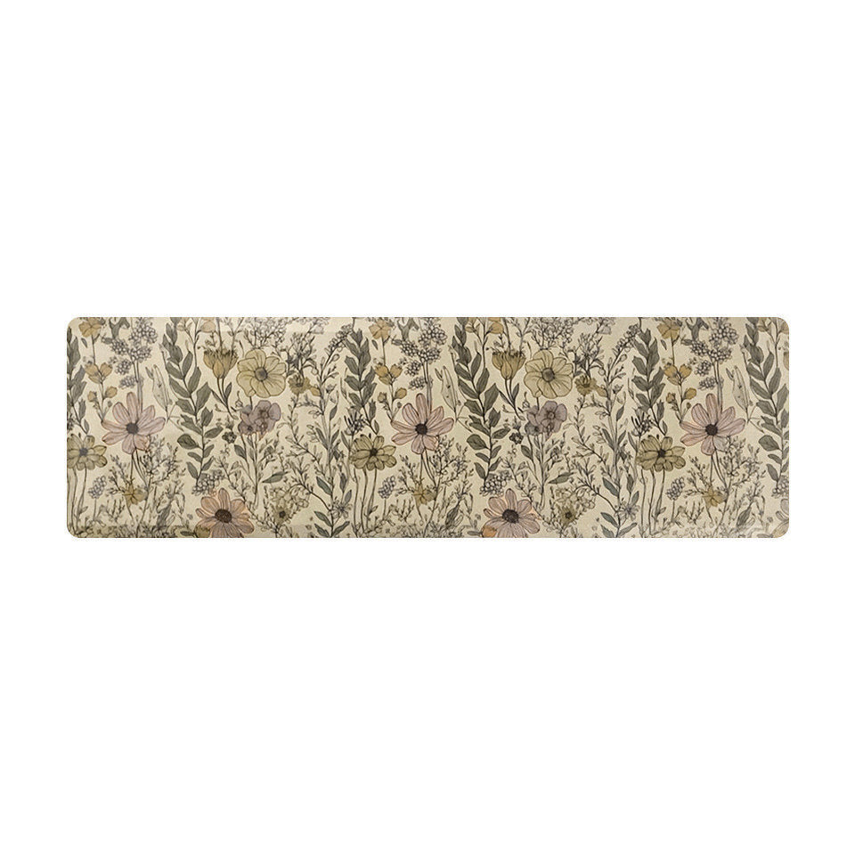 Happy Feet's anti-fatigue Wildflowers runner mat on a light beige color with a canvas-liked textured background.