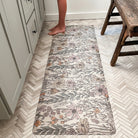 Wild Flower runner mat in a bathroom with a young kid standing on the mat.