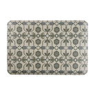 Happy Feet’s Zahra Leaf anti-fatigue small mat features an alternating leaf motif in earth tones on a beige background.