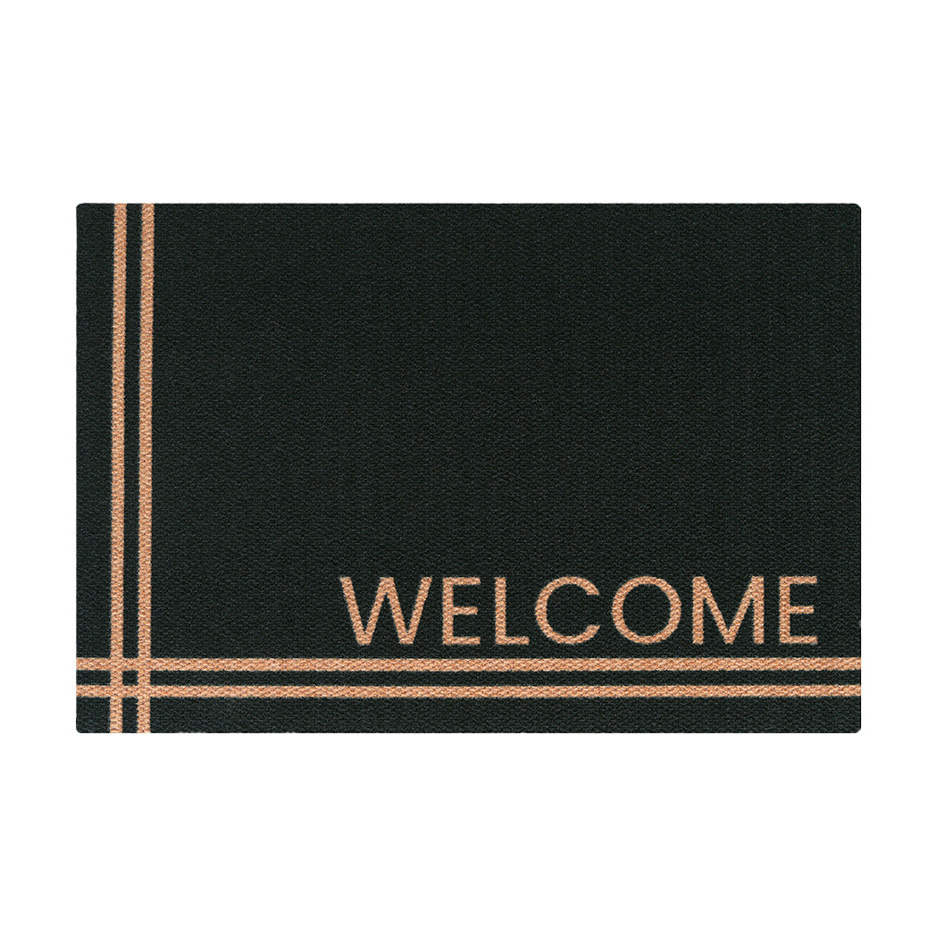 Isolated black doormat personalized with a coir colored welcome in the lower right corner with two pairs of # meeting in the lower left corner