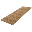 Angle shot of bi level double door chevron pattern doormat in wheat