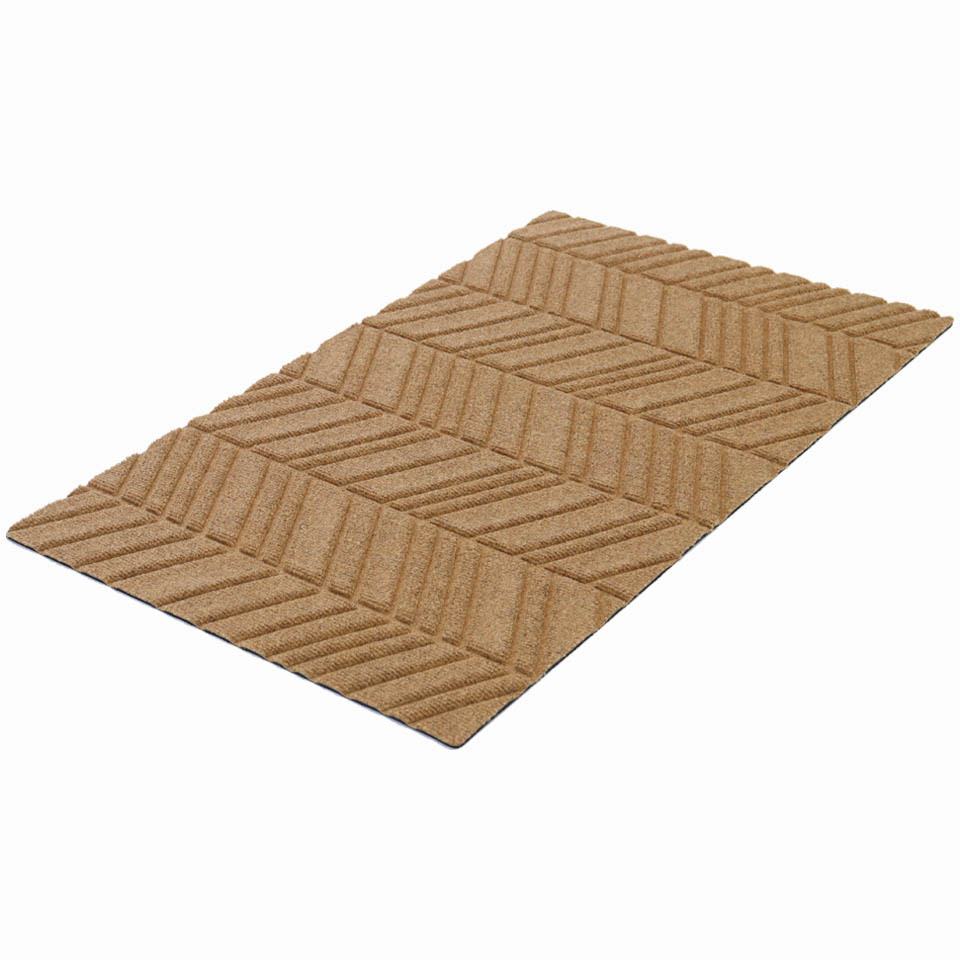 Isolated shot of wheat colored doormat with bi level fade resistance top