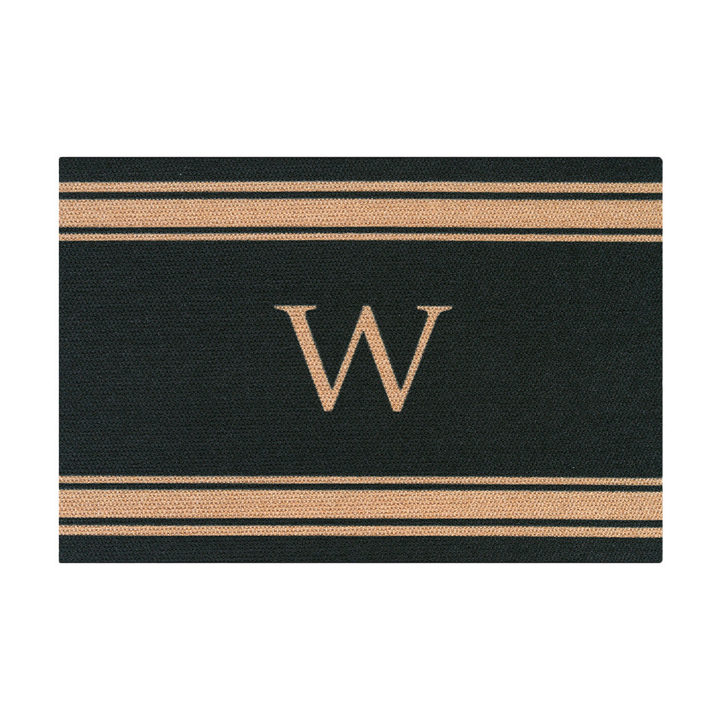 Large black doormat monogrammed with a serif W in coir with three horizontal stripes above and below