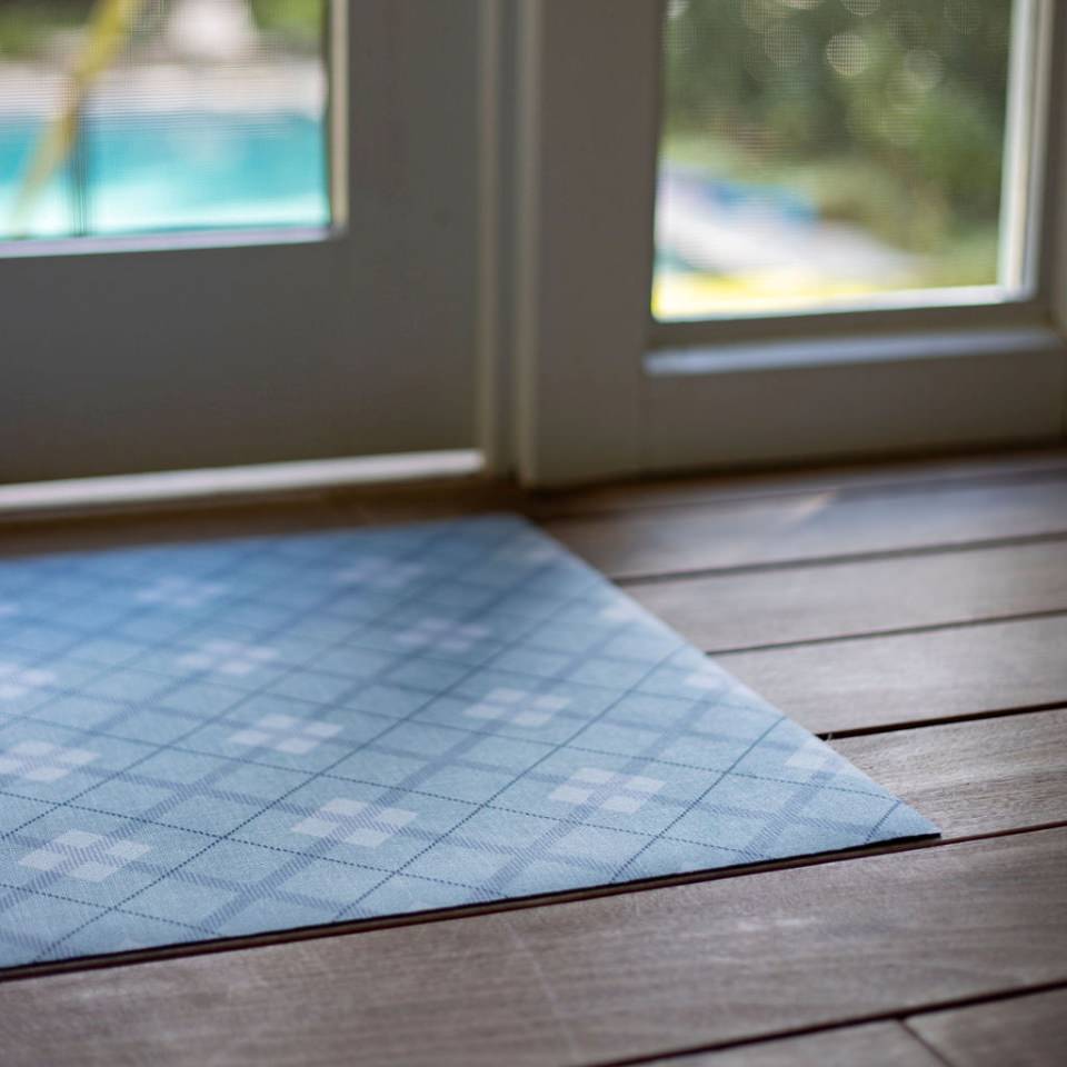 Un-Rug in Sea Salt blue plaid interior low profile rubber backed floor mat in diamond pattern.