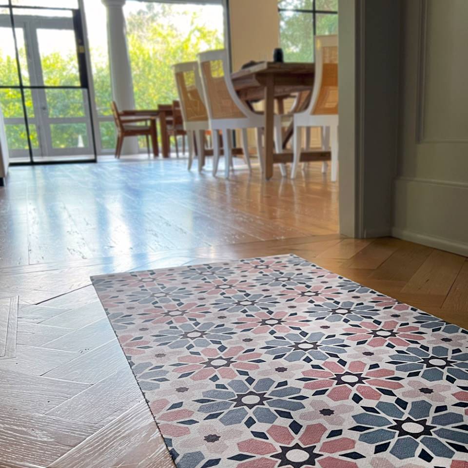 Pink, blue and beige Moroccan style pattern on an indoor washable hallway runner mat. 