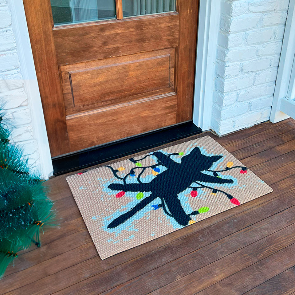 Christmas Vacation doormat Aunt Bethany's fried pussycat cat mat at the front door.