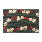 Classic holiday themed doormat featuring a classic garland design with pops of red and white on a dual green background.