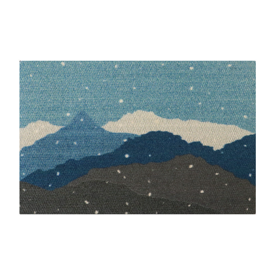 Beautiful wintery landscape welcome mat; featuring snowy mountains in shades of blues, greens, and white.