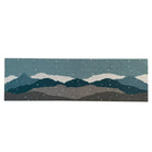 Beautiful double door wintery landscape doormat; featuring snowy mountains in shades of blues, greens, and white with rounded corners.