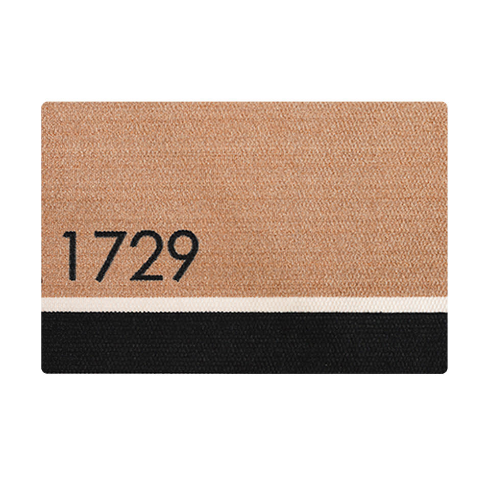The Modern Main Personalized doormat is a unique doormat that allows you to place your house number or apartment number on your indoor welcome mat and is shown in a black and brown color scheme.