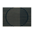 Top view of Neighburly's doormat with a coir, abstract sunset scene made of horizontal lines, on a black mat
