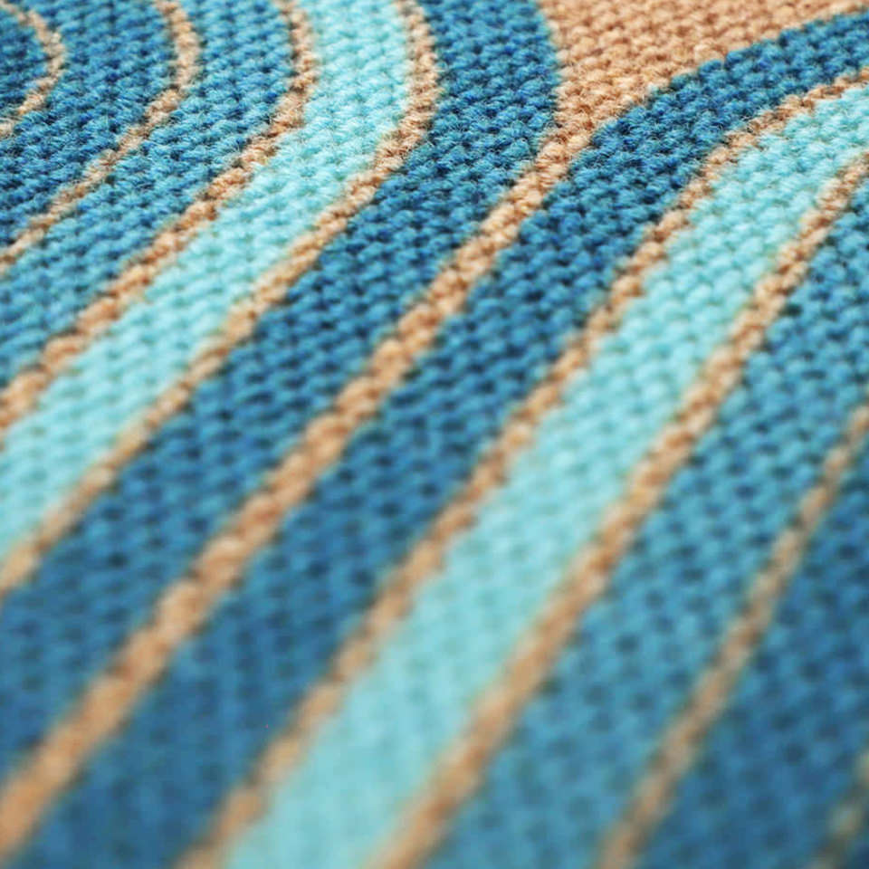 Close up of our retro design Retro Vibes from our mid century modern collection of doormats. Aqua and Coir in curved lines gives a nostalgic MCM look