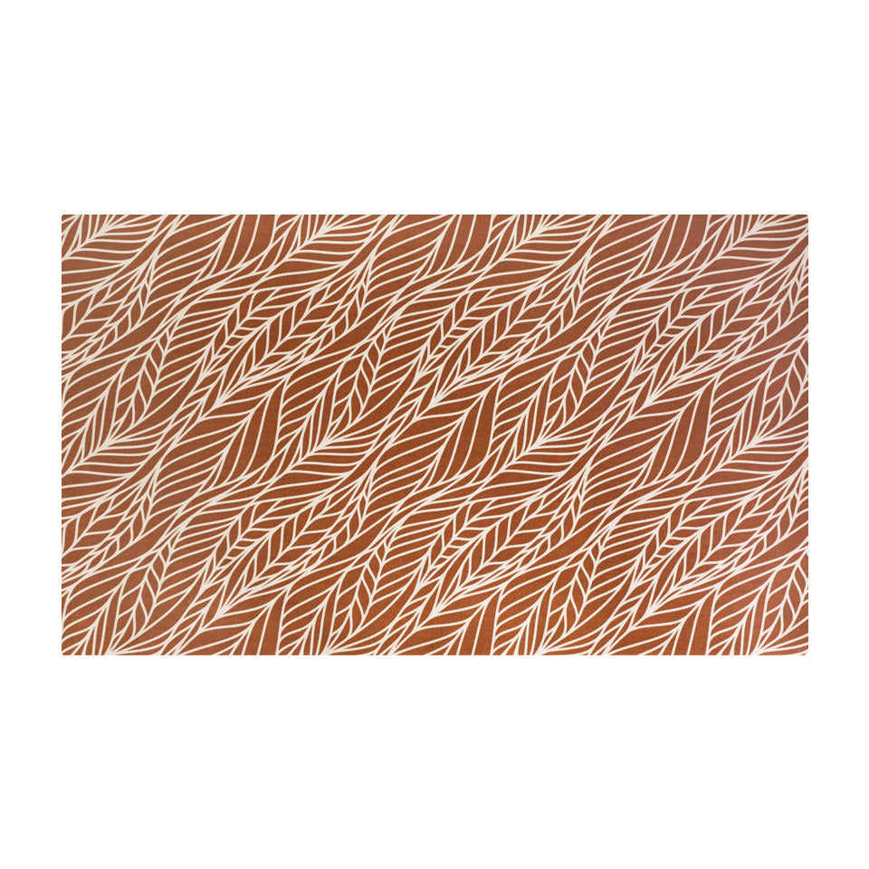 Abstract cream colored leaf pattern on burnt orange linen look low profile washable floormat