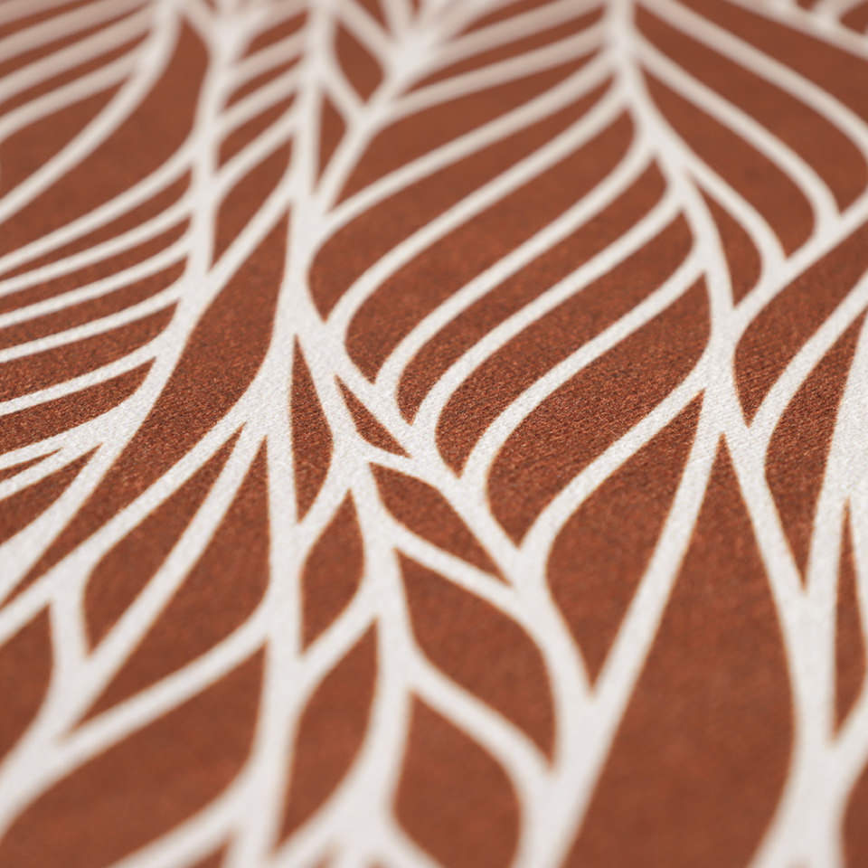 Close up of Abstract cream colored leaf pattern on burnt orange linen look low profile washable floormat