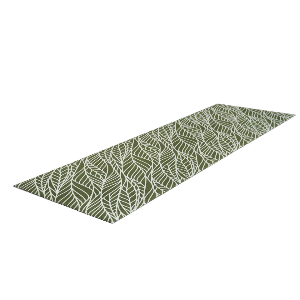 Overhead angled shot of Abstract cream colored leaf pattern on medium olive green linen look low profile washable floor mat