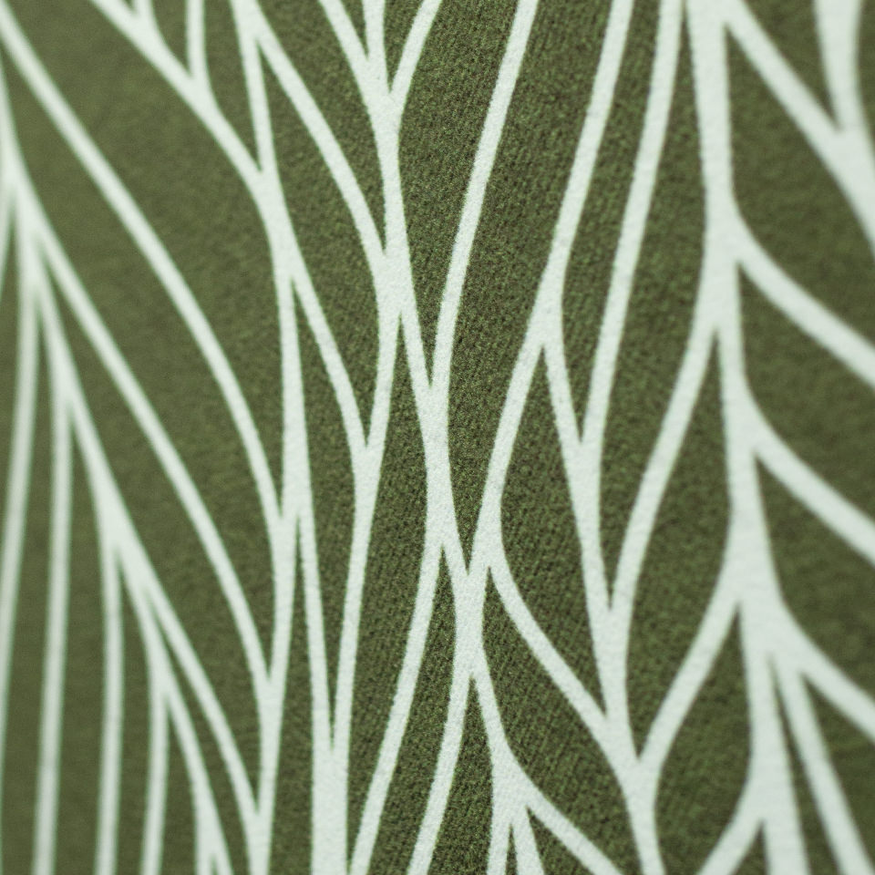 Close up of abstract cream colored leaf pattern on medium olive green linen look low profile washable floormat
