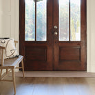 Boucle Weave runner along side closed, double doors at the entrance of a home