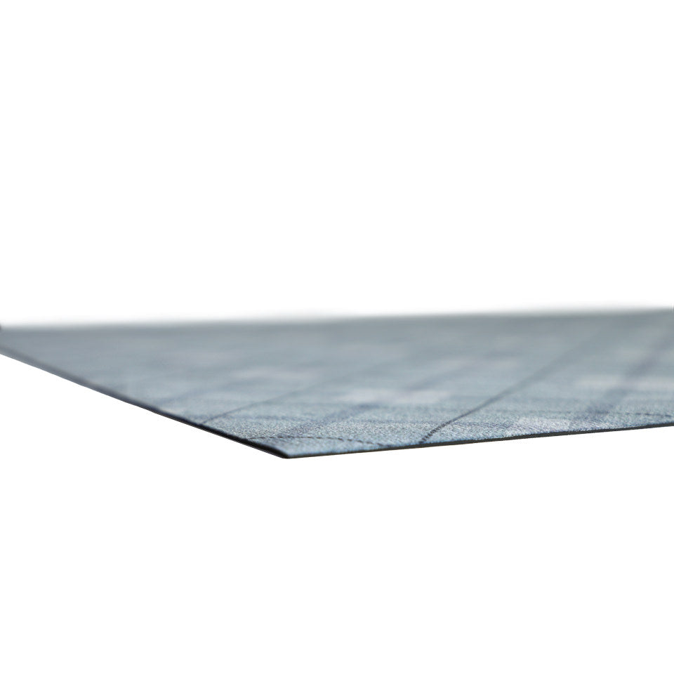 Low profile view of Sea Salt blue plaid interior floor mat in diamond pattern