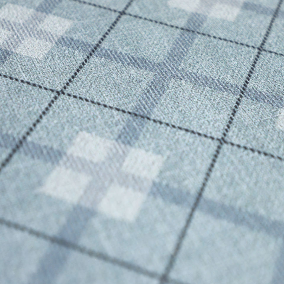 Close up of low profile Sea Salt blue plaid interior floor mat with rubber backing n diamond pattern