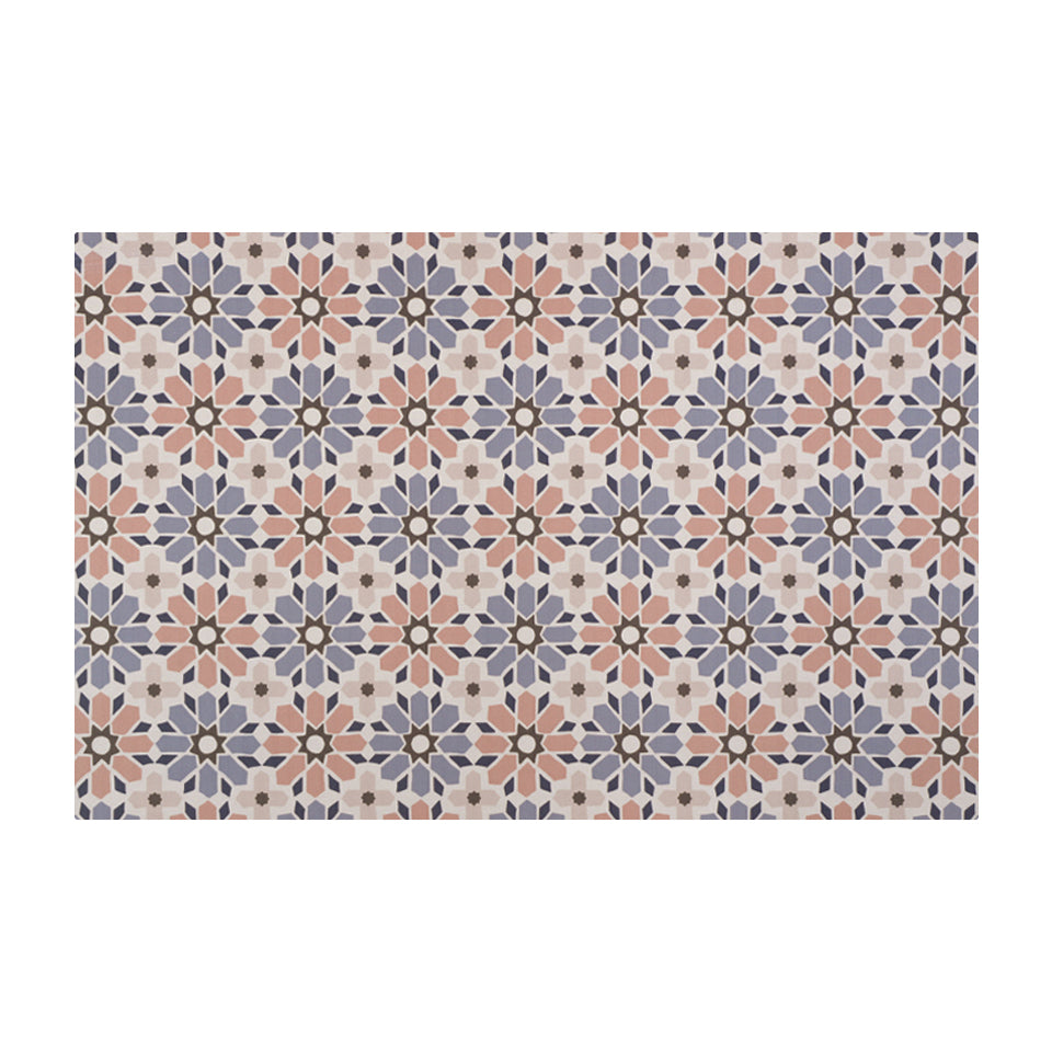 Small Moroccan tiled low profile washable indoor floor mat in pinks, blues, and beige